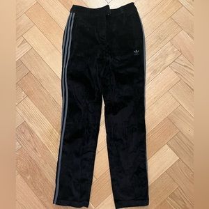 Adidas corduroy track pants in black and grey side stripes